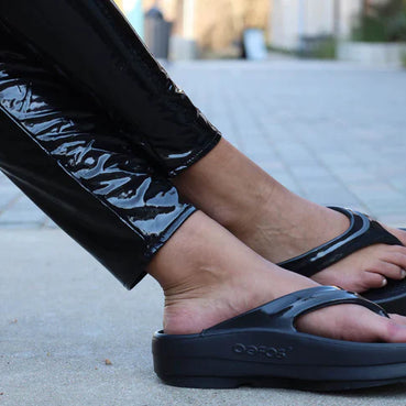 Oomega Oolala - Women by Oofos in black comfortable recovery sandal with OOfoam technology and patented footbed for active use