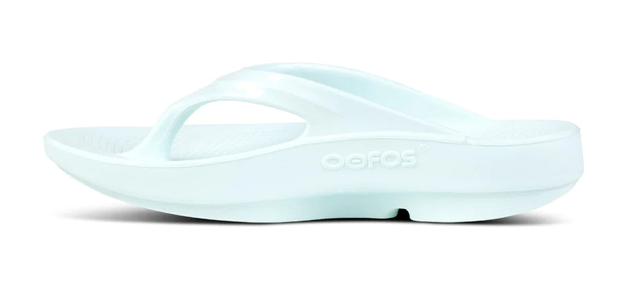 OOlala - Women by Oofos in light blue slide sandal with patented OOfoam footbed absorbing 37% more impact for all-day comfort