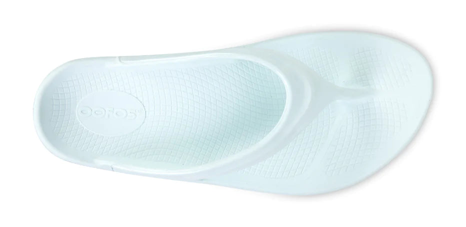 OOlala - Women by Oofos in light blue with patented OOfoam for impact absorption, lightweight slides ideal for casual wear and recovery