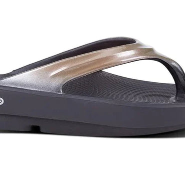 OOlala Luxe - Women by Oofos in black and metallic gold with patented OOfoam footbed, lightweight slides for all-day comfort and style