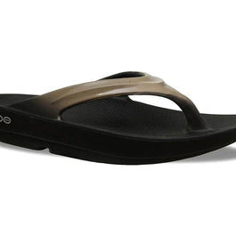 OOlala Luxe - Women by Oofos in black and taupe with patented OOfoam footbed for all-day comfort and stylish casual wear
