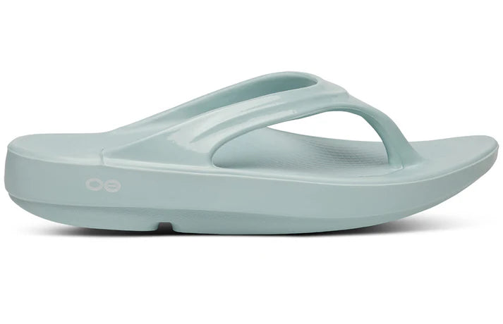 OOlala - Women by Oofos in light blue slide sandal with patented OOfoam footbed absorbing 37% more impact for all-day comfort
