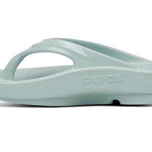 OOlala - Women by Oofos in light blue slide sandal with patented OOfoam footbed for 37% more impact absorption, ideal for casual wear and recovery