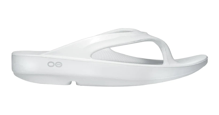 OOlala - Women by Oofos in white slide sandal with patented OOfoam footbed absorbing 37% more impact for all-day comfort