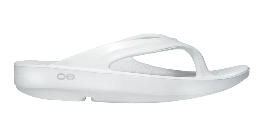 OOlala - Women by Oofos in white slide sandal with patented OOfoam footbed absorbing 37% more impact for all-day comfort