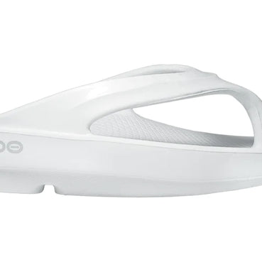 OOlala - Women by Oofos in white slide sandal with patented OOfoam footbed absorbing 37% more impact for all-day comfort