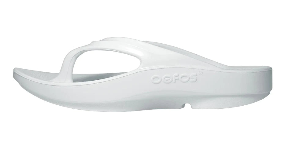 OOlala - Women by Oofos in white with patented OOfoam footbed absorbing 37% more impact, lightweight slides for casual wear
