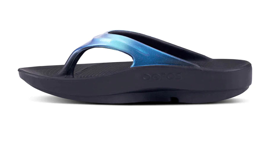 OOlala Luxe - Women by Oofos in black with blue hand-painted straps, lightweight OOfoam slides for comfort and stylish everyday wear