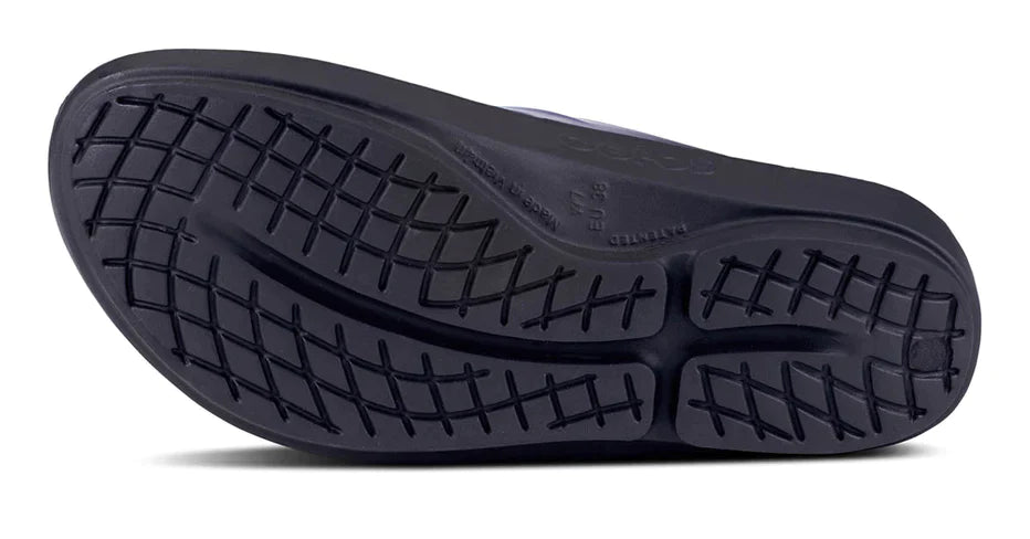 OOlala Luxe - Women by Oofos in black with patented OOfoam, cushioned slide sandal with streamlined footbed for all-day comfort and style