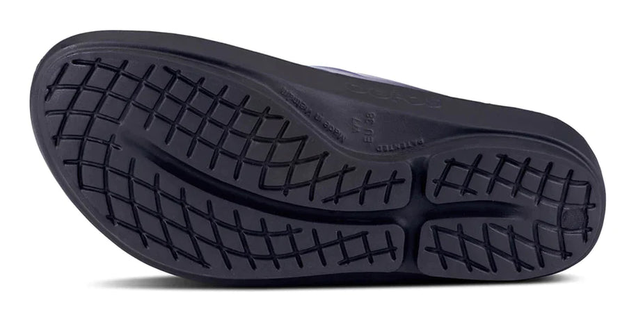 OOlala Luxe - Women by Oofos in black with patented OOfoam, cushioned slide sandal with streamlined footbed for all-day comfort and style