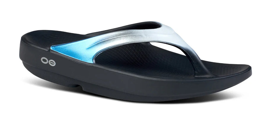 OOlala Luxe - Women by Oofos in black and metallic blue oofoam sandal with streamlined footbed for comfort and stylish casual wear