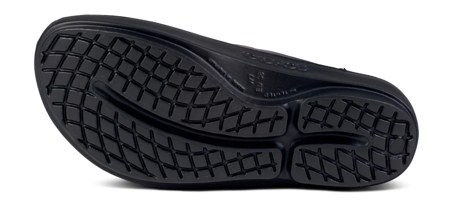OOlala Luxe - Women by Oofos in black, lightweight patented OOfoam slide sandal with streamlined footbed for all-day comfort and style