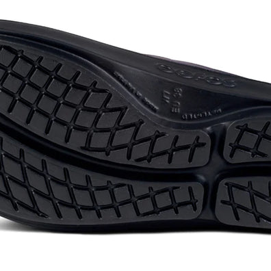 OOlala Luxe - Women by Oofos in black, lightweight patented OOfoam slide sandal with streamlined footbed for all-day comfort and style