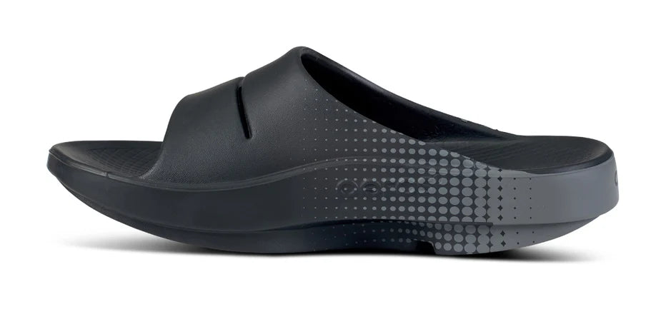 OOahh Sport - Unisex by Oofos in black with agile OOfoam strap for support, comfort, and shock absorption ideal for casual and recovery wear
