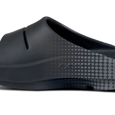 OOahh Sport - Unisex by Oofos in black with agile OOfoam strap for support, comfort, and shock absorption ideal for casual and recovery wear