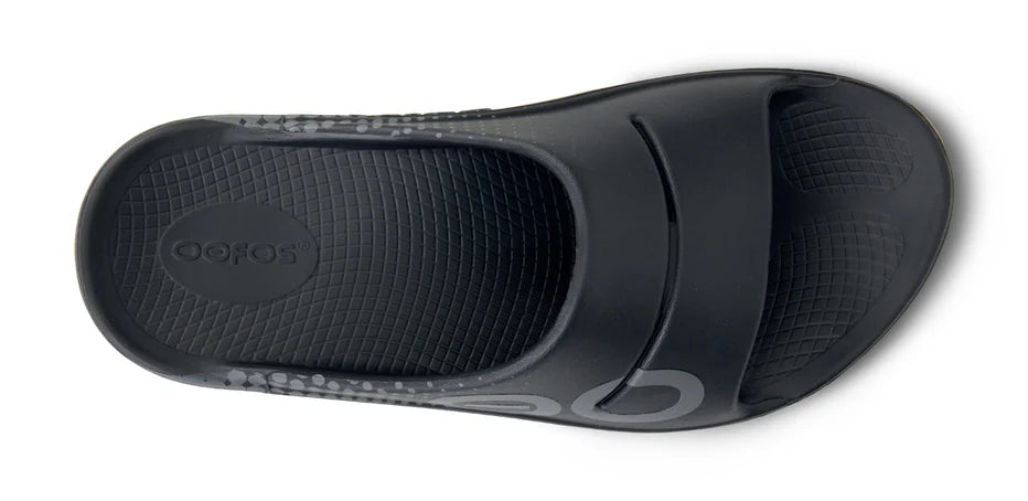 OOahh Sport - Unisex by Oofos in black with agile OOfoam strap, absorbing 37% impact, designed for comfort and recovery use