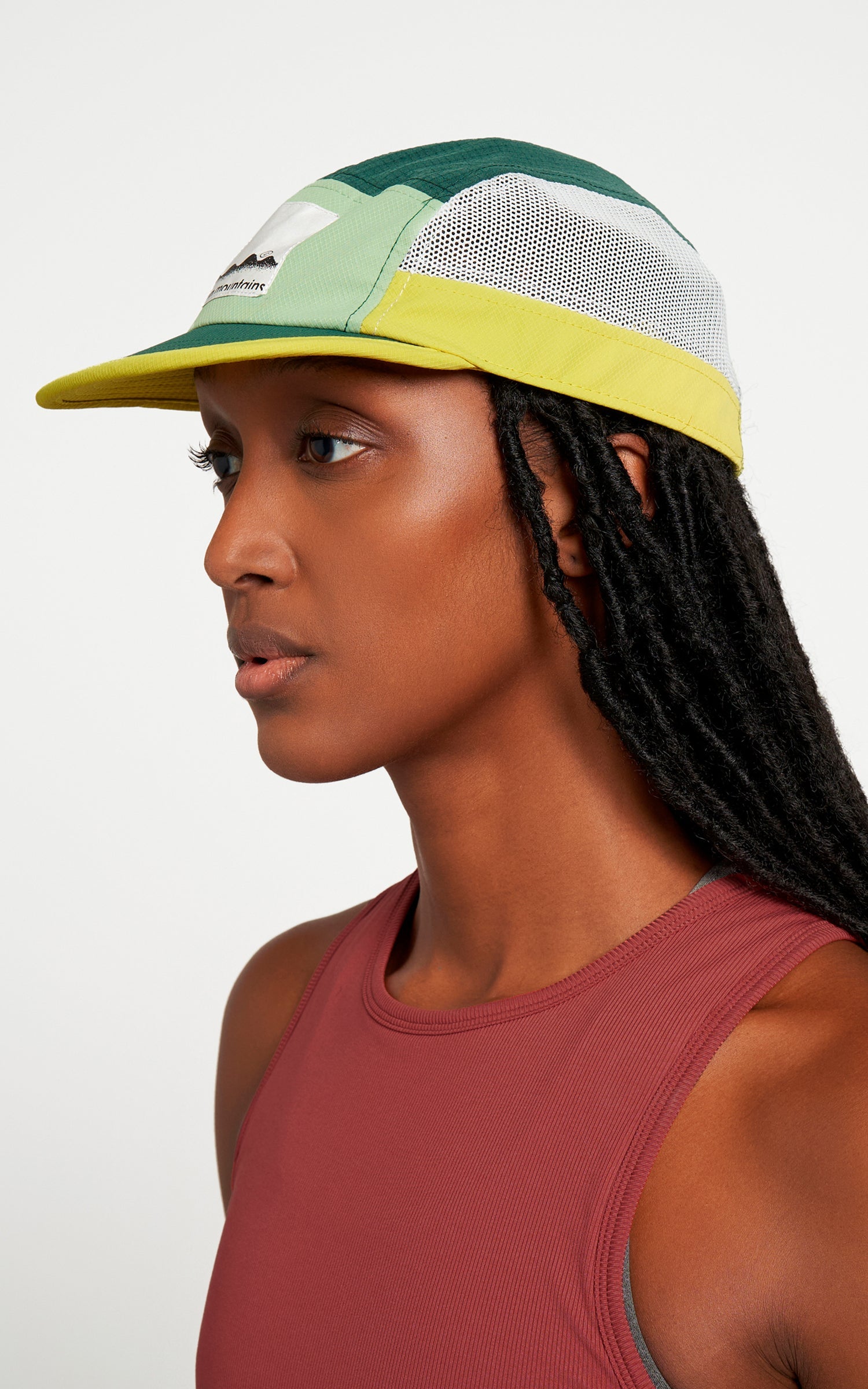 ALZCap Trail - Mountain Cut by Ciele in green and yellow with COOLmatic PLUS mesh for cooling and odor protection, ideal for running outdoors