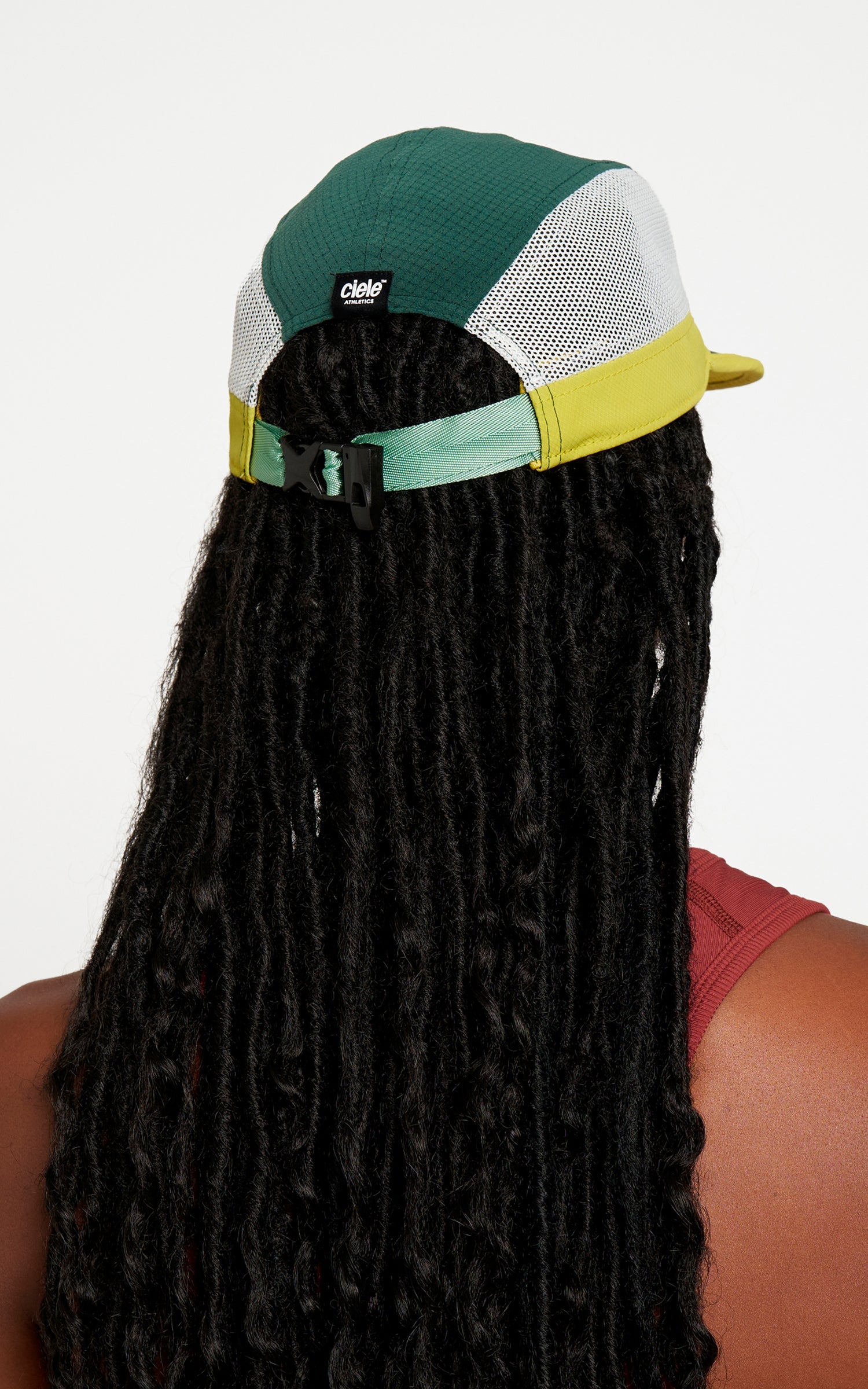 ALZCap Trail - Mountain Cut by Ciele in green, white, and yellow with COOLmatic PLUS mesh for cooling and odor protection, men's and women's running headwear