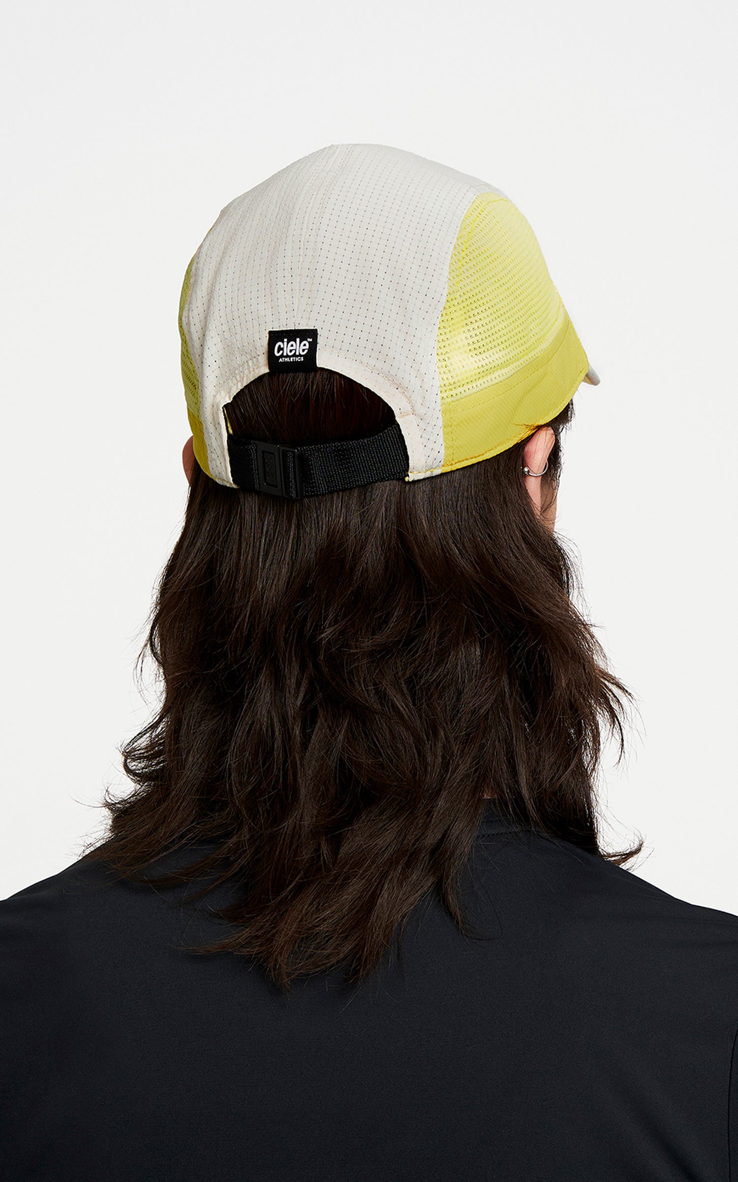 FSTCap SC - ZOF by Ciele in white and yellow, low-profile cycling-inspired brim cap, breathable headwear for running and outdoor use