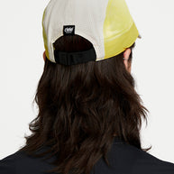 FSTCap SC - ZOF by Ciele in white and yellow, low-profile cycling-inspired brim cap, breathable headwear for running and outdoor use