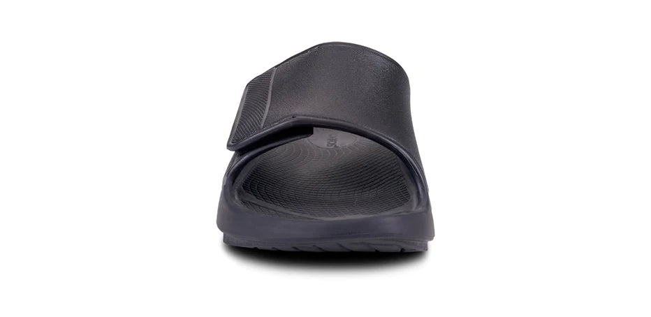 OOahh Sport Flex - Unisex by Oofos in black with adjustable OOfoam™ strap for superior support and comfort, ideal for recovery and casual wear