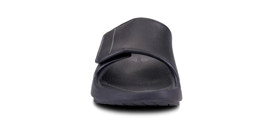 OOahh Sport Flex - Unisex by Oofos in black with adjustable OOfoam™ strap for superior support and comfort, ideal for recovery and casual wear