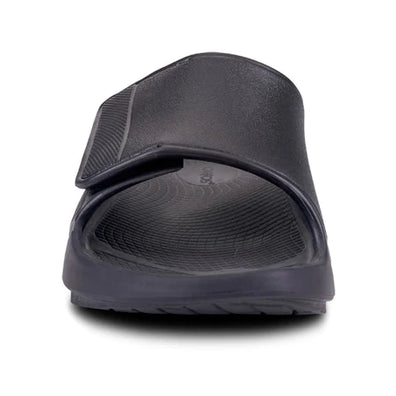 OOahh Sport Flex - Unisex by Oofos in black with adjustable OOfoam™ strap for superior support and comfort, ideal for recovery and casual wear