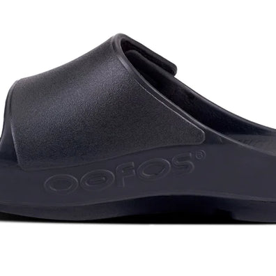 OOahh Sport Flex - Unisex in black by Oofos, lightweight slides with agile OOfoam strap for comfort and adjustable upper support, ideal for recovery and casual wear