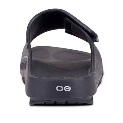 OOahh Sport Flex - Unisex by Oofos in black with adjustable OOfoam™ strap for support and comfort, ideal for recovery and casual wear