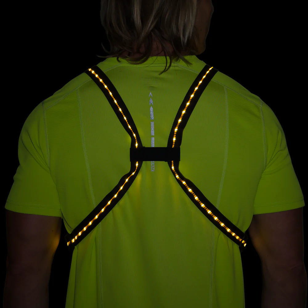 Laser Light Web Vest by Nathan in black with LED threads and reflective web, lightweight safety vest for low light running use