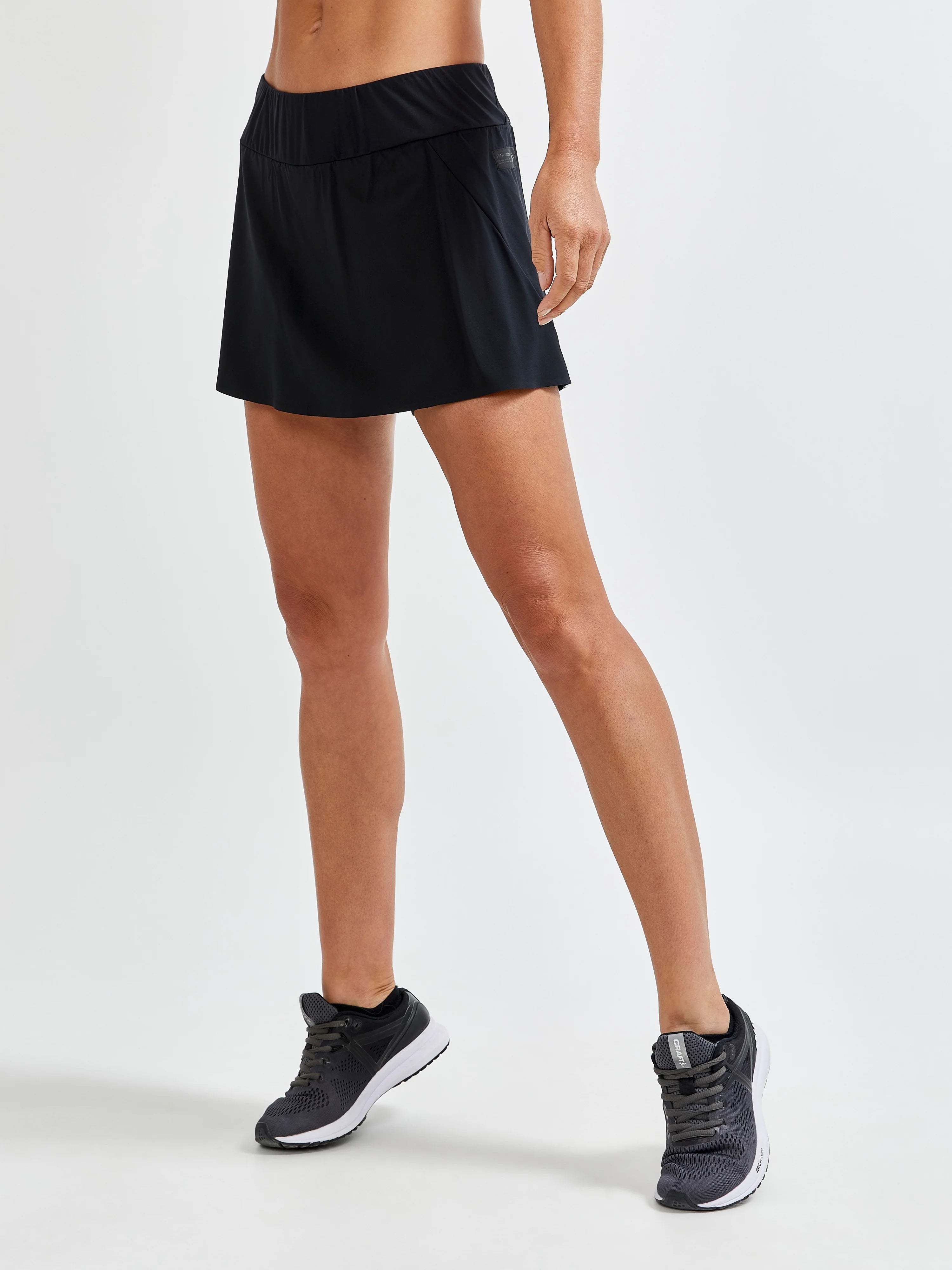 PRO Hypervent 2-in-1 Skirt - Women by Craft in black, soft recycled stretch fabric with mesh inner, ideal for running in hot weather