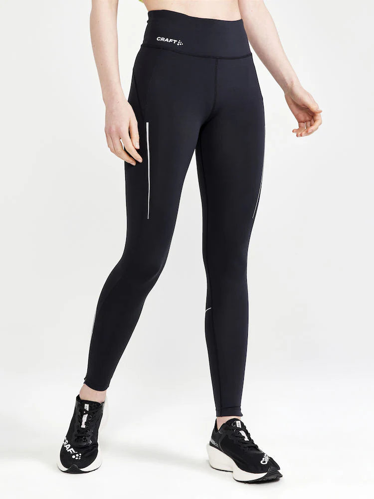 ADV Essence Run Tights - Women by Craft in black, soft recycled polyester and elastane with wide adjustable waistband for running and training.