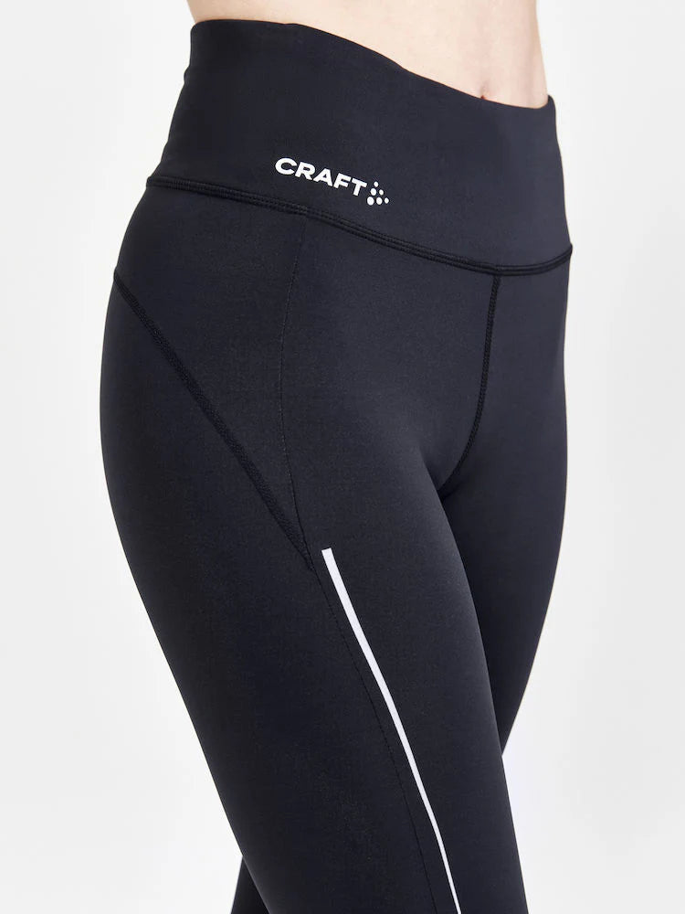 ADV Essence Run Tights - Women by Craft in black with wide adjustable waistband, soft recycled polyester for running and training