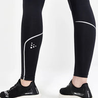 ADV Essence Run Tights - Women by Craft in black with reflective details, soft recycled polyester, wide waistband, ideal for running and training