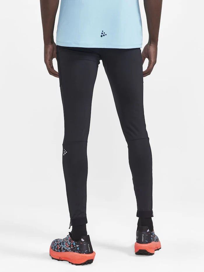 PRO Trail Tights - Men by Craft in black, high-performance recycled polyamide running tights for trail running with moisture transfer