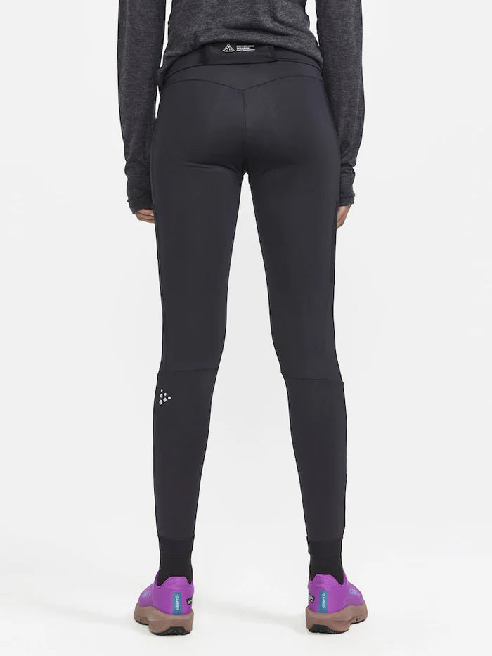 PRO Trail Tights - Women by Craft in black, high-performance recycled polyamide running tights for trail running with moisture transfer