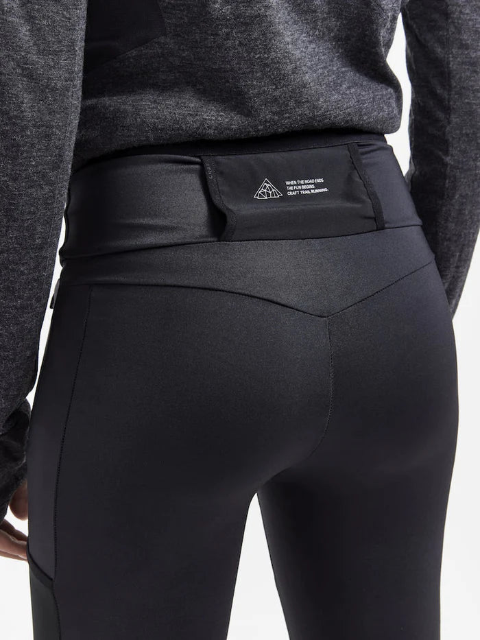 PRO Trail Tights - Women by Craft in black, recycled polyamide moisture-wicking tights designed for high-performance trail running.