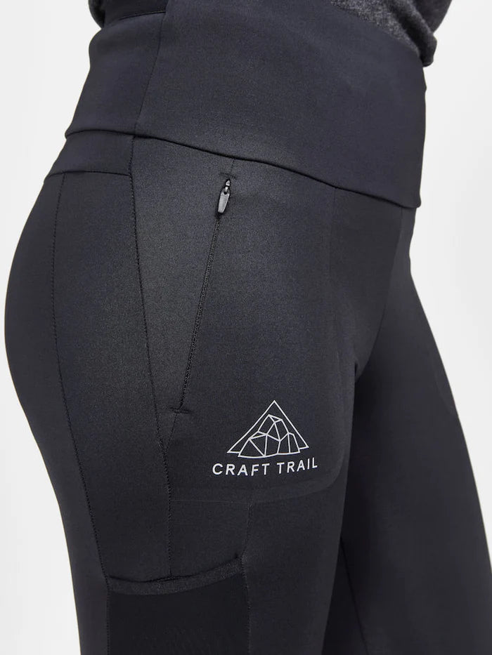 PRO Trail Tights - Women by Craft in black, recycled polyamide jersey with moisture transfer, zip pocket, designed for high-performance trail running