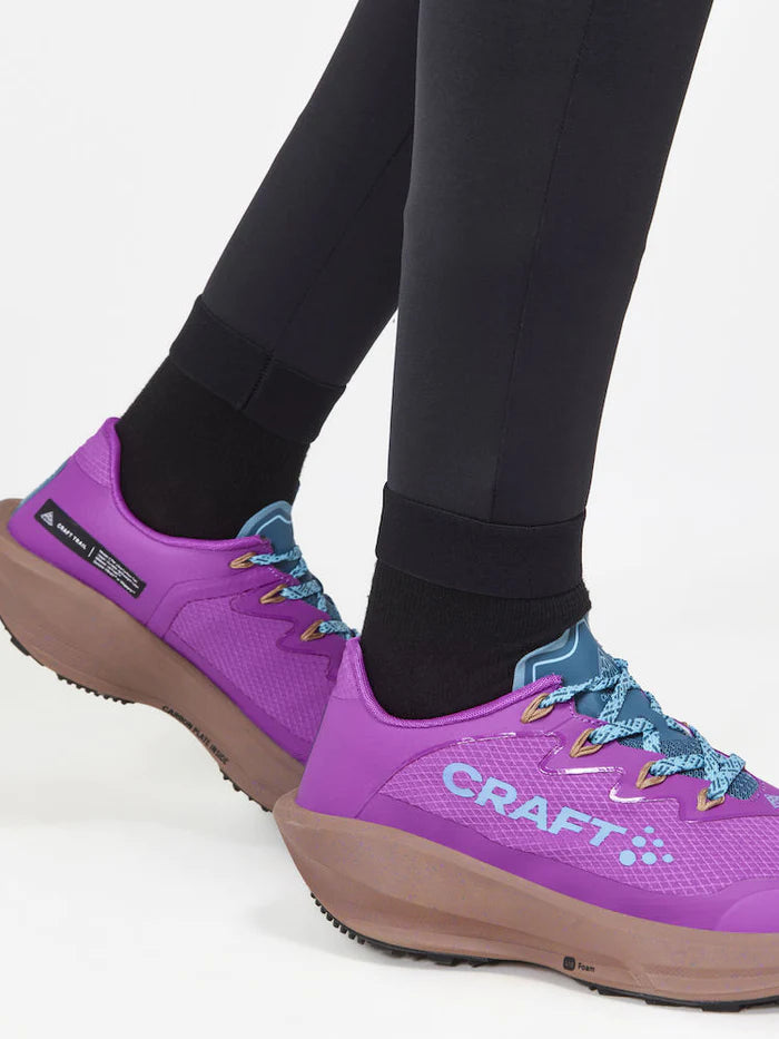 PRO Trail Tights - Women by Craft in black, high-performance recycled polyamide running tights ideal for trail running.