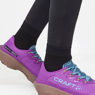 PRO Trail Tights - Women by Craft in black, high-performance recycled polyamide running tights ideal for trail running.