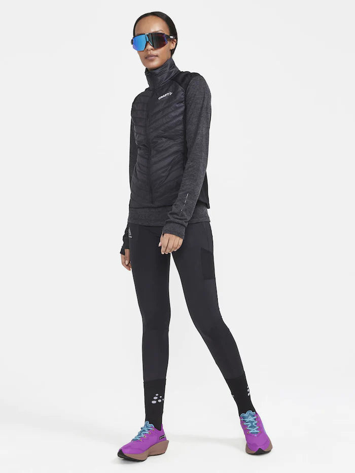 PRO Trail Tights - Women by Craft in black, pro-grade recycled polyamide running tights with moisture transfer, ideal for trail running
