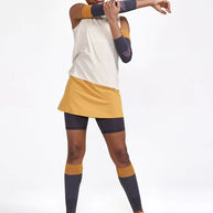 PRO Trail 2in1 Skirt - Women by Craft in mustard yellow with 4-way stretch recycled polyester for high-performance trail running.
