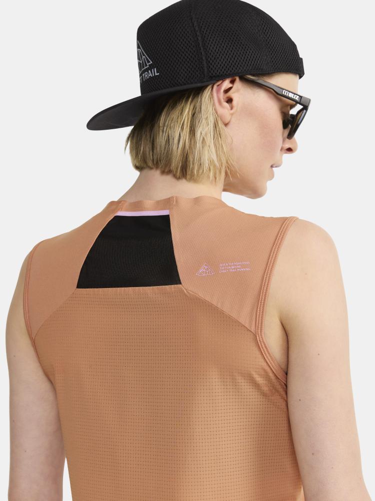 PRO Trail Singlet - Women by Craft in terracotta with jacquard-knit ripstop fabric, designed for high-intensity trail running and ventilation