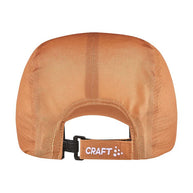 PRO Run Soft Cap by Craft in burnt orange with mesh panels and taped seams, lightweight running cap for high-intensity workouts