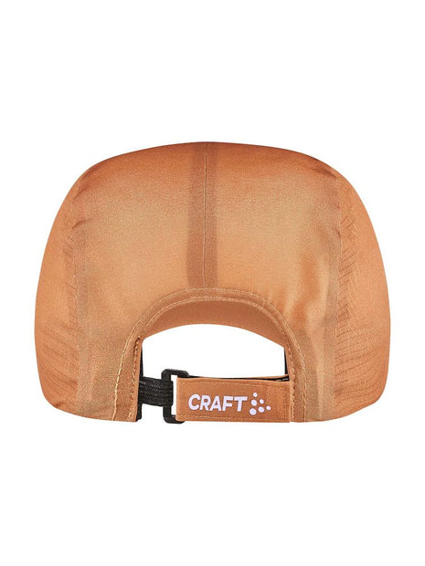 PRO Run Soft Cap by Craft in burnt orange with mesh panels and taped seams, lightweight running cap for high-intensity workouts
