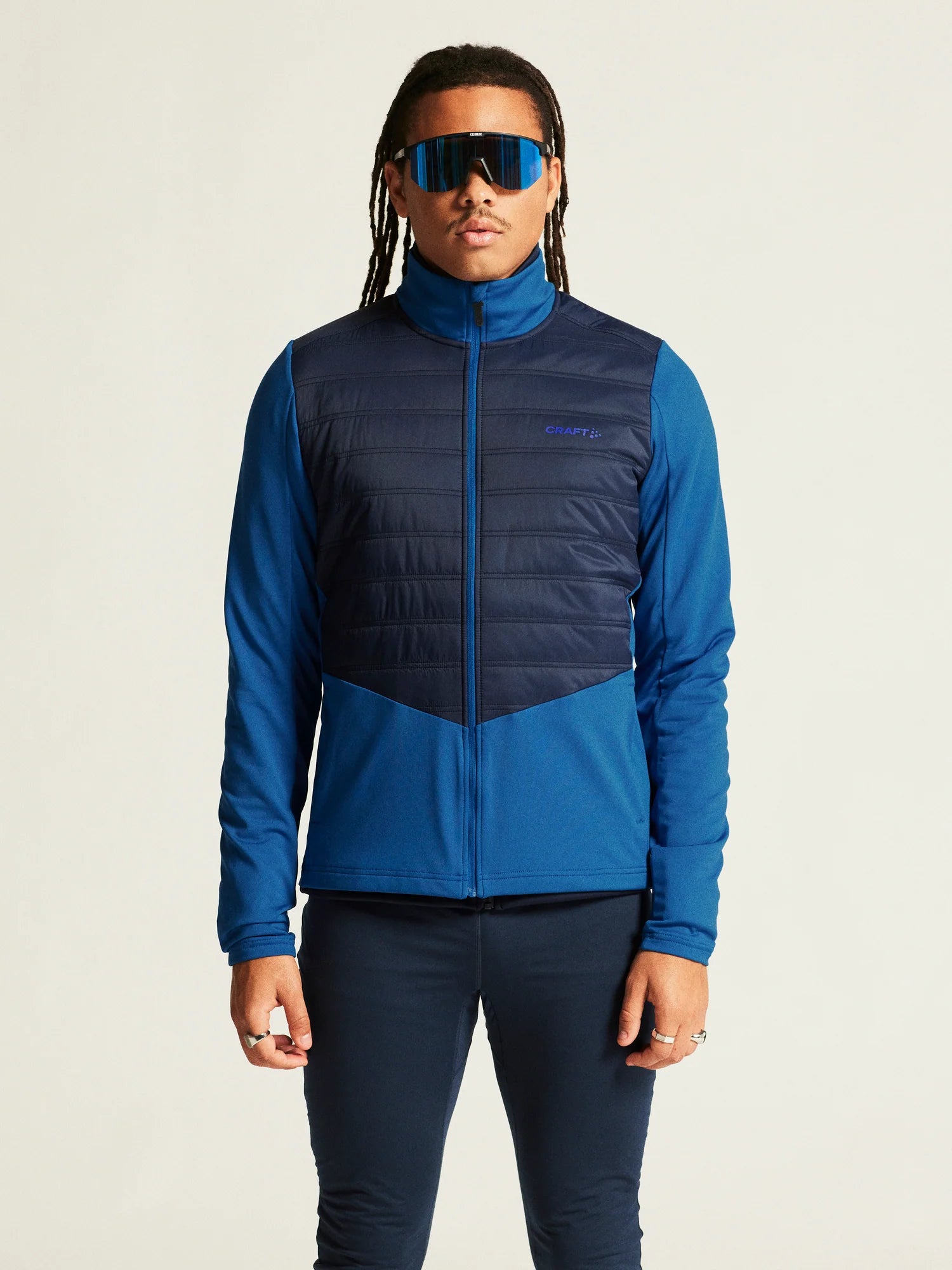 ADV Essence Warm Jacket 2 - Men by Craft in blue and navy, warm quilted, wind-protective jacket for cold multi-sport training
