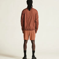 Pro Hypervent Jacket 2 - Men by Craft in rust red, ventilating running jacket with super-soft fabric for performance running and workouts