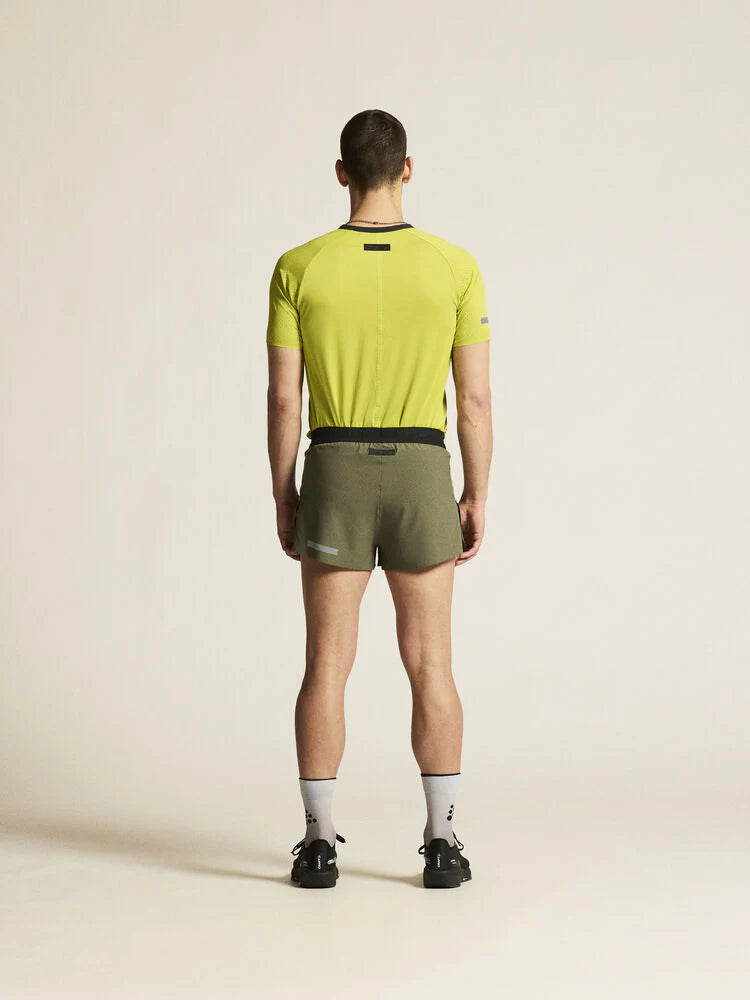 Pro Hypervent Split Shorts 2 - Men by Craft in olive green with black waistband, lightweight ventilating running shorts for hot weather workouts