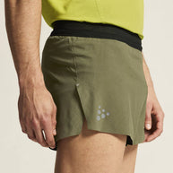 Pro Hypervent Split Shorts 2 - Men by Craft in olive green and black, lightweight ventilating running shorts for hot weather workouts