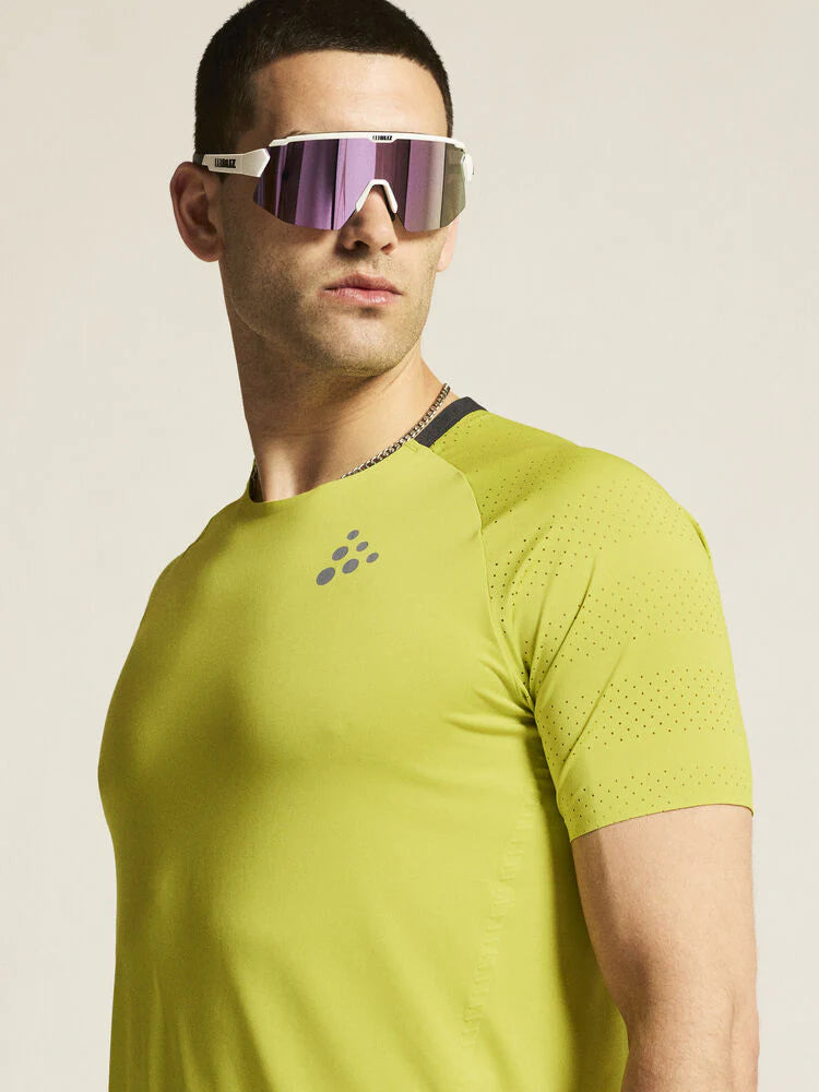 PRO Hypervent Tee 2 - Men by Craft in lime green, lightweight running tee with ventilation and cooling for hot weather performance